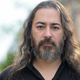 Image for article titled Cult Leader Warns Followers Things Need To Get Way More Deranged To Be Made Into HBO Documentary Series
